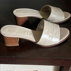 Calvin Klein Cream Mules with Elegant Design